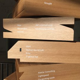 Floor level pylon sign wood detail