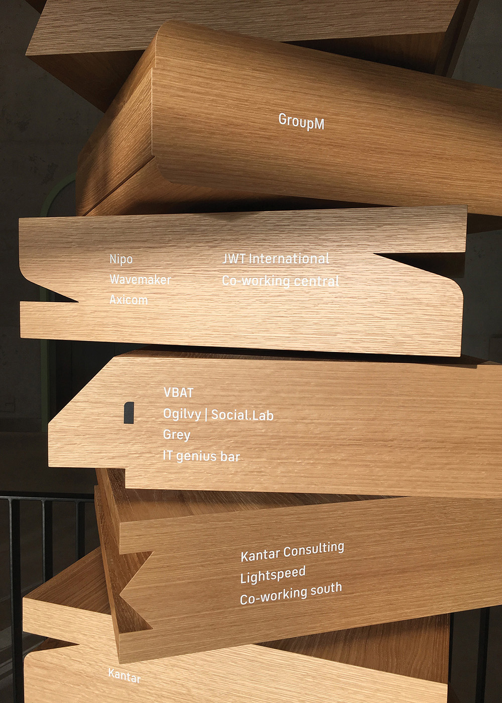 Floor level pylon sign wood detail