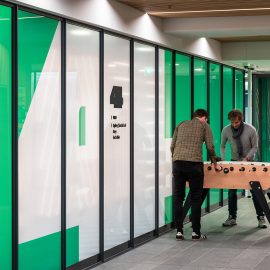 Floor level number and wayfinding at wall