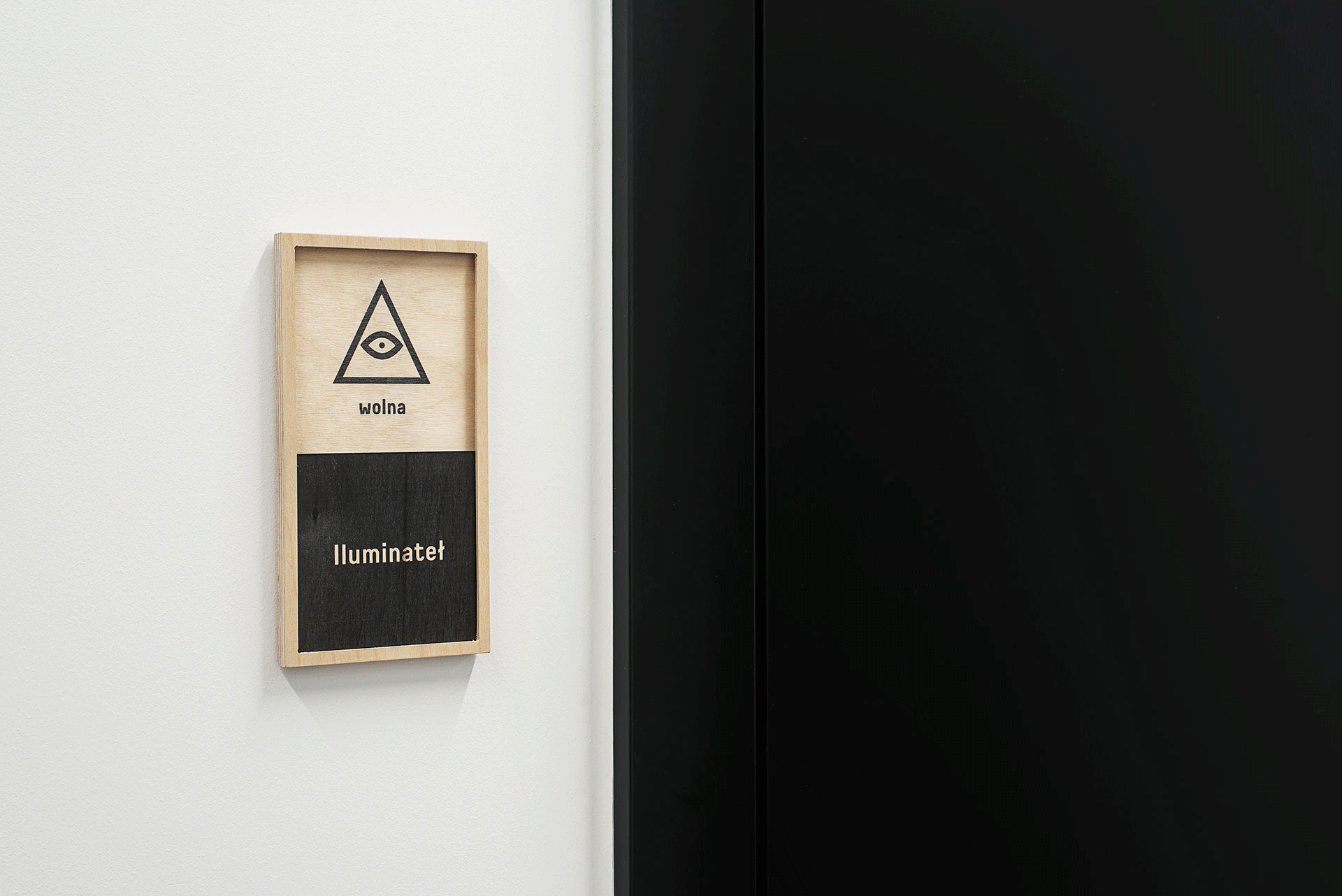 conference room sign with moving panel