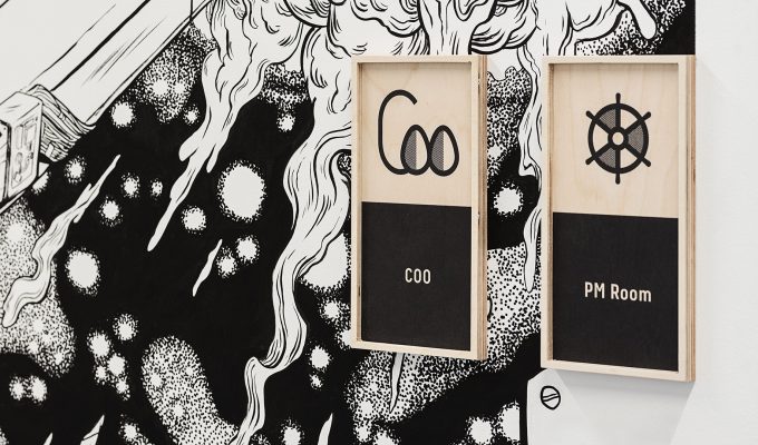 COO and PM room signs at wall